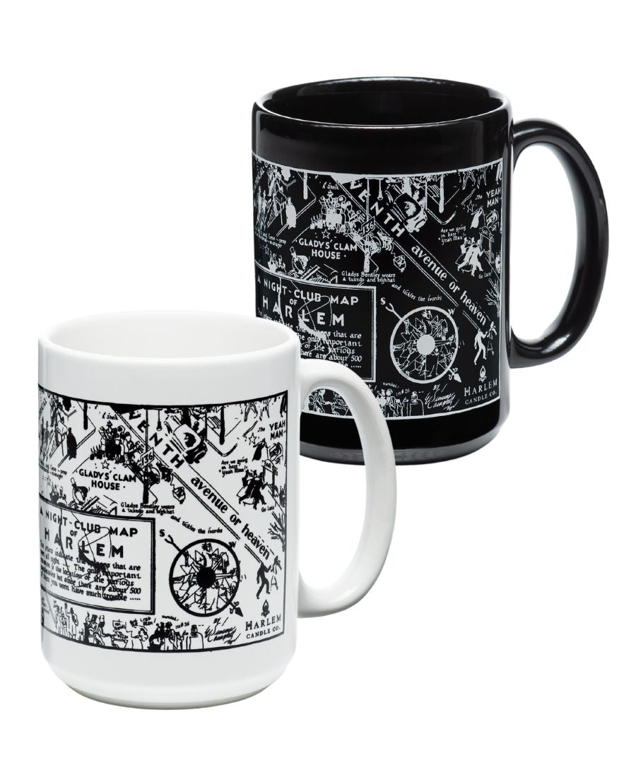 Two mugs, one white and one black, with black and white designs on a white background