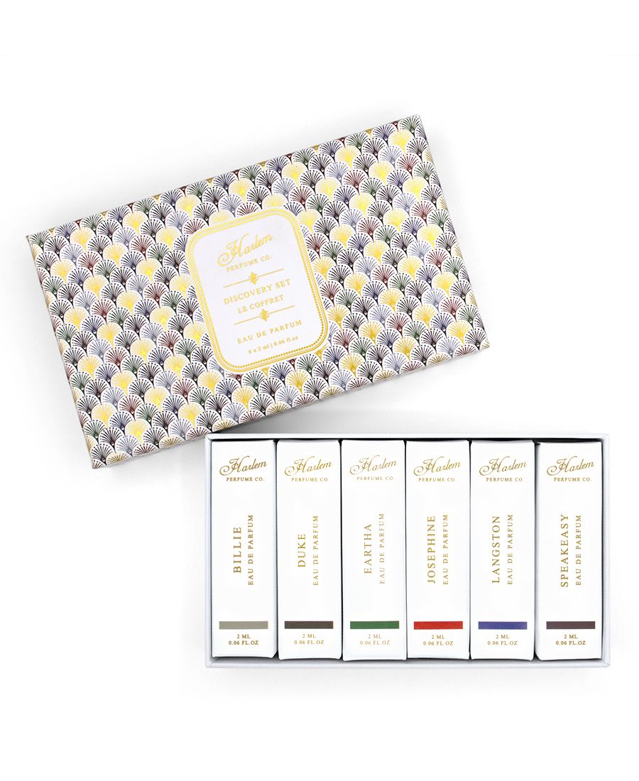 This is an image of our discovery set of six 2ml eaux des parfums samples featuring Billie, Duke, Eartha, Josephine, Langston, and Speakeasy.  The image also includes the gift box the set come in.