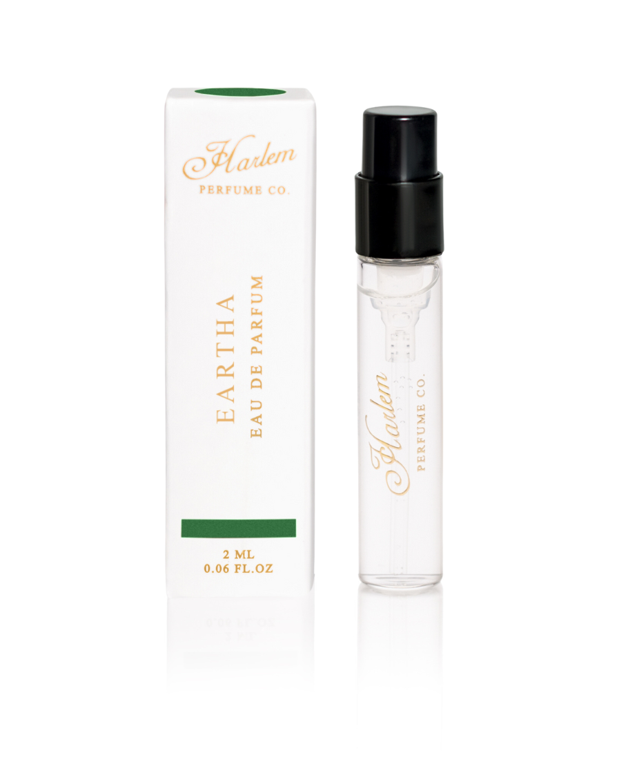 This is an image of our Eartha 2ml perfume next to it's decorative box.