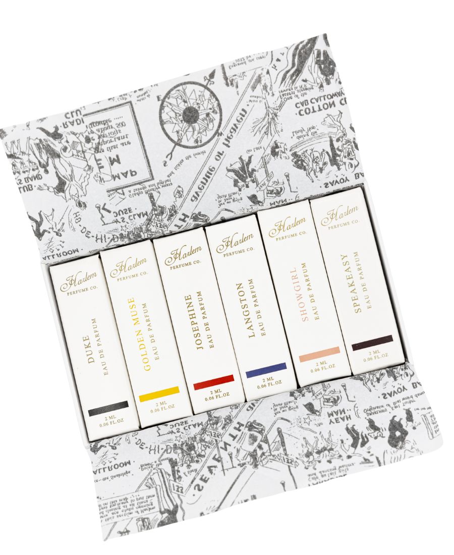 Set of Harlem perfume 2ml bottles in a decorative box with black and white illustrations on a white background.