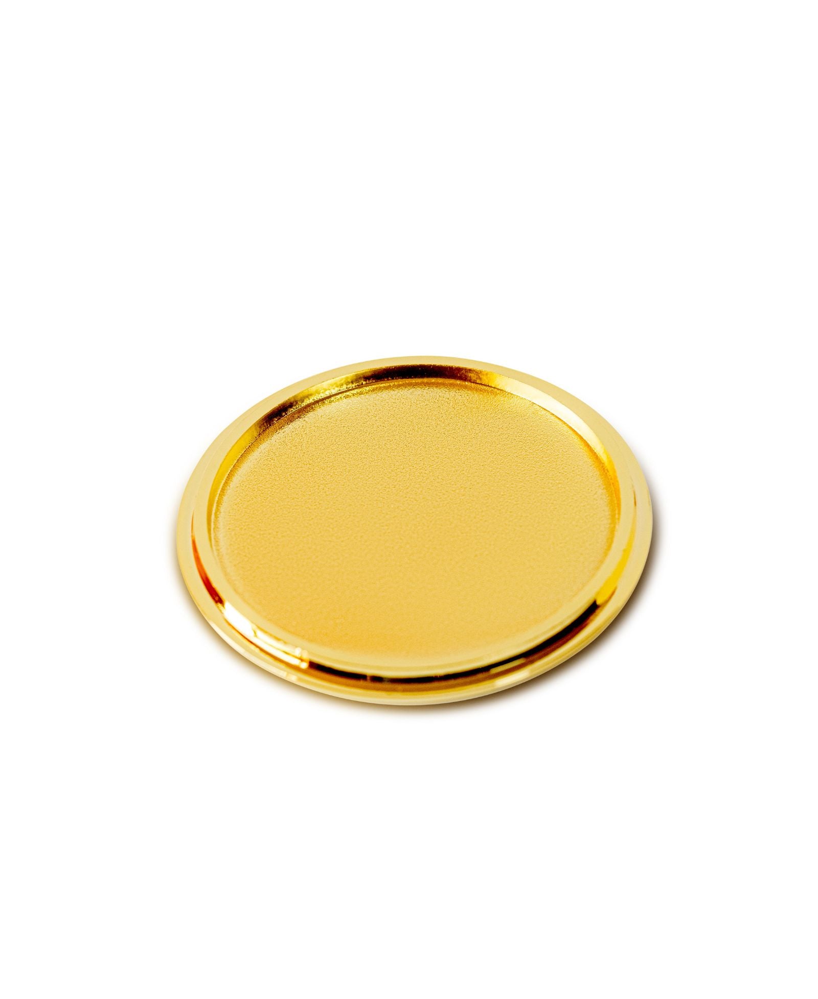 This is an image of the other side of our Harlem Candle Company gold candle lid on a white background.