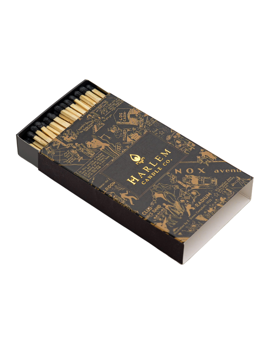 This is an image of our black tip matches in the Nightclub Map of Harlem gold and black box.