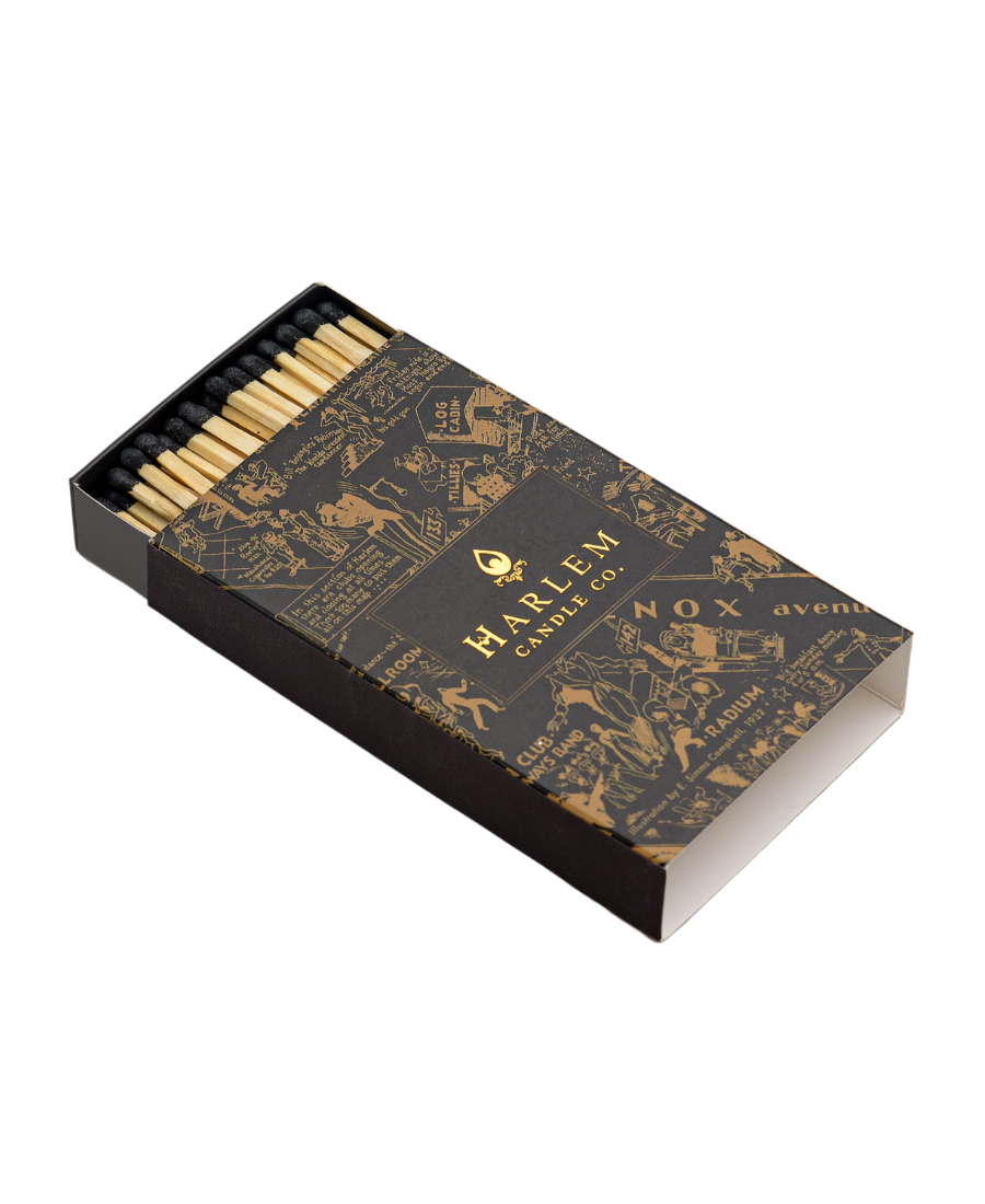 This is an image of our black tip matches in the Nightclub Map of Harlem gold and black box.